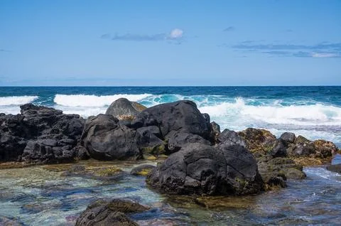 Waves breaking on Gris Gris Beach, Souillac, Mauritius Photos