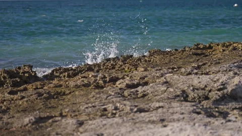 Waves Breaking onto Jagged Rocks Tropical Island Tide Pools Drone Stock Footage 288038611