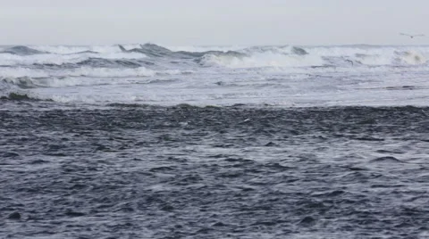 WAVES BREAKING ON NORTHWEST BEACH Stock Footage 52553342