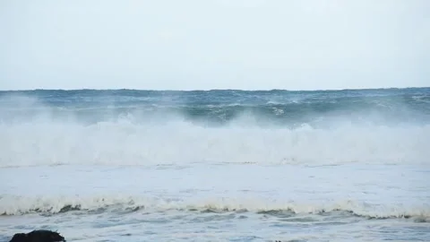 Waves breaking offshore beyond a foaming surf line at Unstad, Vestvagoy, Stock Footage 344536728