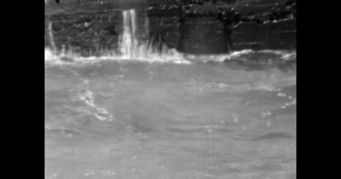 Waves breaking over concrete wall, Sea storm concept, Sunny daytime seascape 스톡 동영상 312200188