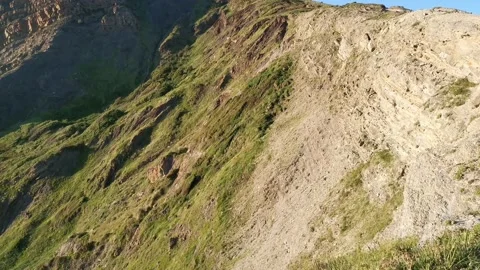 Waves breaking over a cove Stock Footage 130855205