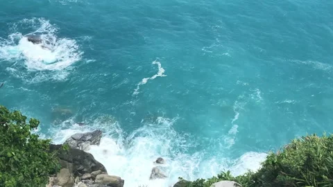 Waves Breaking Over Dark Coastal Rocks Into White Foam On The East Coast Stock Footage 342831076