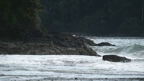 Waves breaking over rocks Stock Footage 126669718