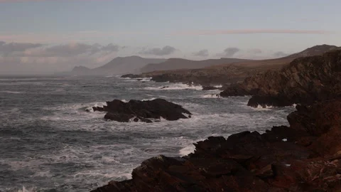 Waves Breaking Over Sea Rocks on a Rocky Coast. Achill Island, Ireland. 4K60 Stock Footage 239548086