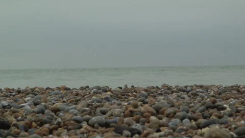 Waves Breaking On A Pebble Beach Long Shot 스톡 동영상 144438301