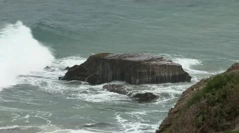 Waves breaking on rock Stock Footage 11143807
