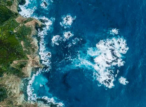 Waves Breaking on Rock Stock Photos