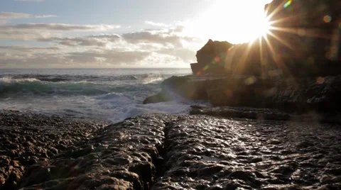 Waves breaking onto Rock Shelf Stock Footage 33826887