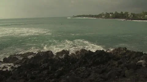 Waves Breaking On The Rocks Against An Overcast Sky 스톡 동영상 19199078