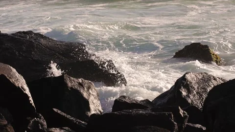 Waves breaking on rocks at Duranbah Beach near the Gold Coast. Stock Footage 325146989
