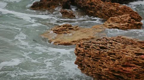 Waves breaking on the rocks Stock Footage 20635312
