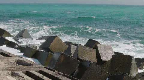 The waves breaking on the rocks Stock Footage 23019670