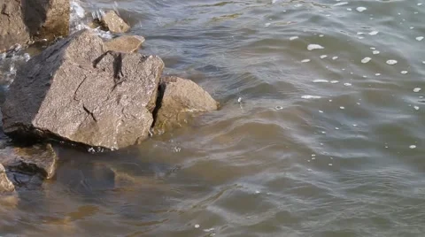 Waves breaking on rocks Stock Footage 63749446