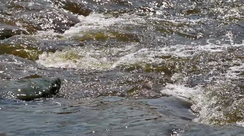 Waves breaking on rocks Stock Footage 63749892
