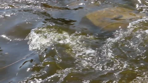 Waves breaking on rocks Stock Footage 63749942