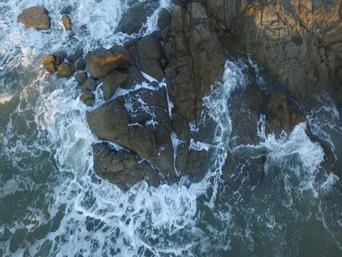 Waves breaking on the rocks Stock Footage 73284144