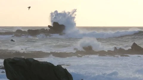 Waves breaking on rocks Stock Footage 131734908