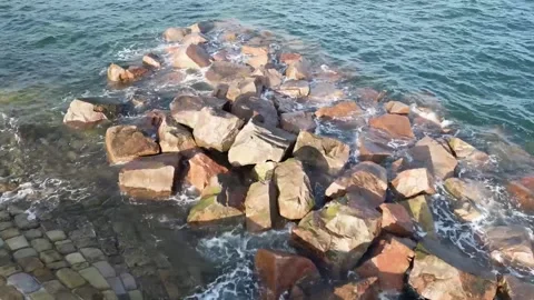 Waves breaking on rocks Stock Footage 285243341