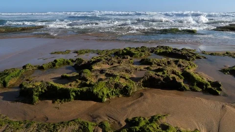 Waves breaking onto rocks on the Garden Route shoree Stock Footage 122104631