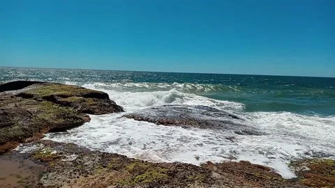 Waves breaking on the rocks of Rio das Ostras Stock Footage 220521004