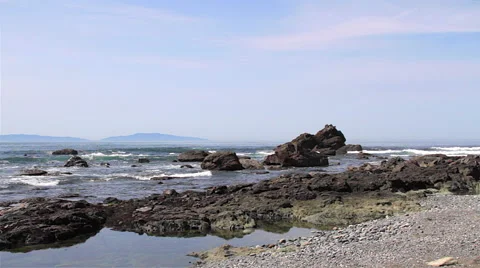 Waves breaking onto rocks at Sombrio Beach, BC, Canada (3159) Video stock 49284641