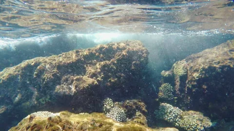 Waves breaking on the rocks - Underwater Stock Footage 61085684