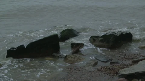 Waves Breaking On A Rocky Beach 스톡 동영상 144440640