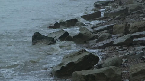 Waves Breaking On A Rocky Beach 스톡 동영상 144440872