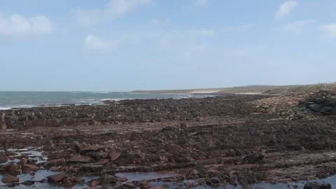 Waves Breaking on Rocky Coast at John O'Groats Looking East Stock Footage 332070313