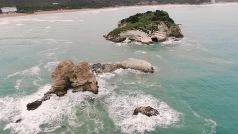 Waves Breaking on Rocky Island Stock Footage 220804795