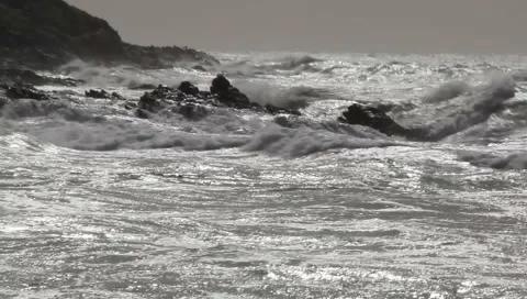 Waves Breaking on rocky shore Stock Footage 1136916