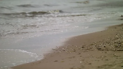 Waves Breaking on a Sandy Beach - Close Up Shot Stock Footage 131246962