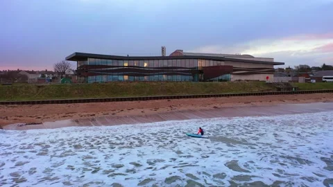 Waves breaking on Scottish beach at high tide, St Andrews Stock Footage 237619731