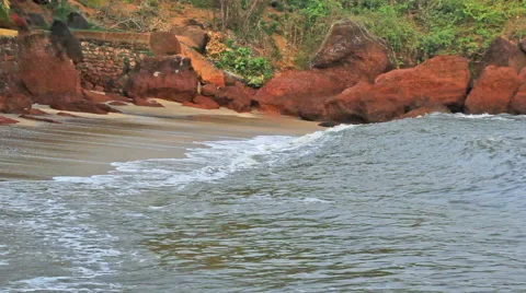 Waves Breaking in Secluded Beach Stock Footage 54910496