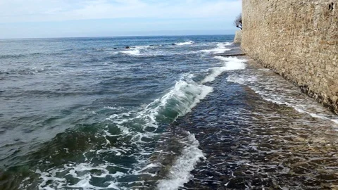 Waves breaking at see side promenade in Novigrad Stock Footage 88201792