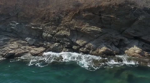 Waves breaking on the shore Video stock 63749802