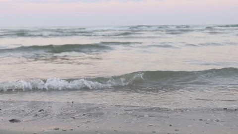 Waves breaking on the shore Video stock 73287977