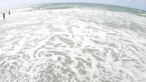 Waves Breaking Onto the Shore Stock Footage 81754182