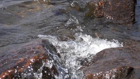 Waves breaking on shore. Stock Footage 98235695