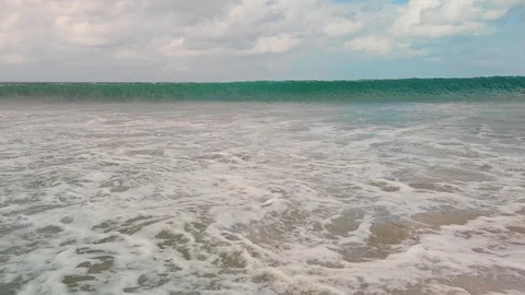 Waves breaking on the shore Video stock 128271260