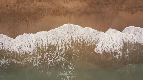 Waves breaking on the shore Stock Footage 154329192