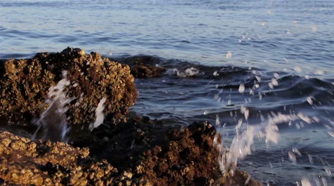 Waves Breaking on Shore Rocks Background A Stock Footage 49796732