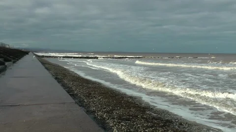 Waves breaking on shore stormy day.mp4 Stock Footage 47089518