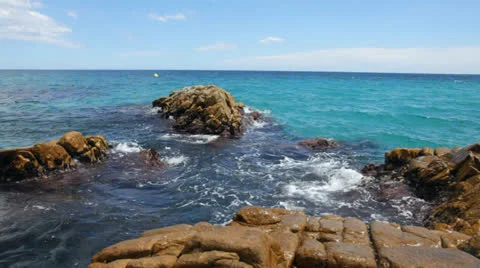 The waves breaking on a stony coastline Stock Footage 24772717