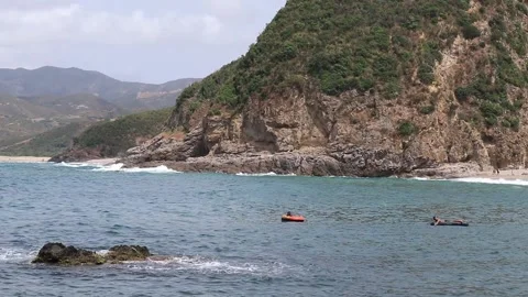 The waves breaking on a stony coastline Stock Footage 156809264