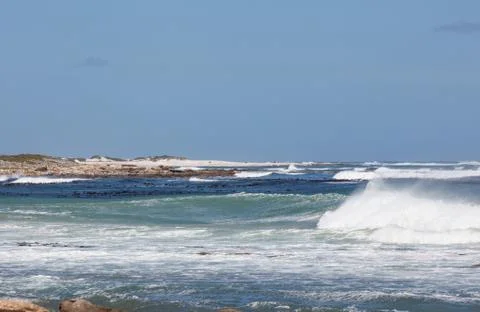 Waves breaking on white sand beach in Cape Point nature reserve Stock Photos