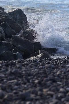 Waves on a breakwater Stock Photos