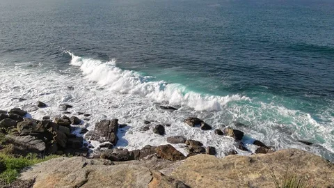 The waves broke on the rock Stock Footage 113937342