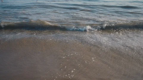 Waves calmly washing on sandy beach. Stock Footage 119118203